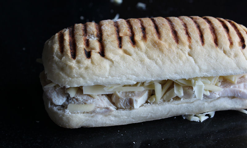 Cold and uncooked panini ready for oven