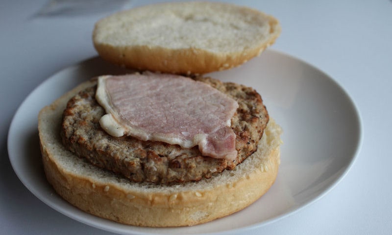 Microwave ready burger in bun with cheese