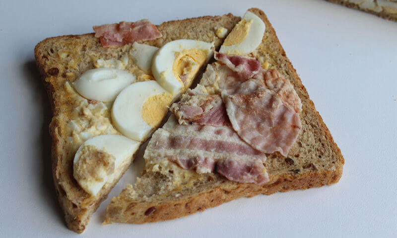 Tesco Egg & Bacon Sandwich, halves on display
