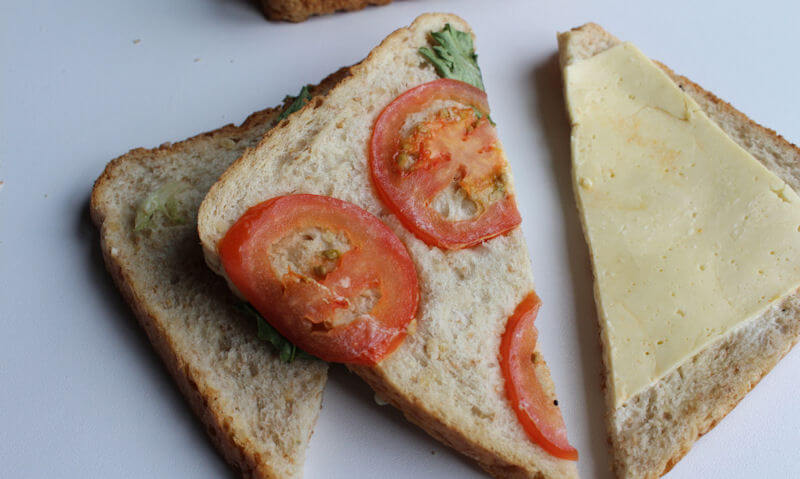 The Chicken Club Sandwich, tomato slices on bread